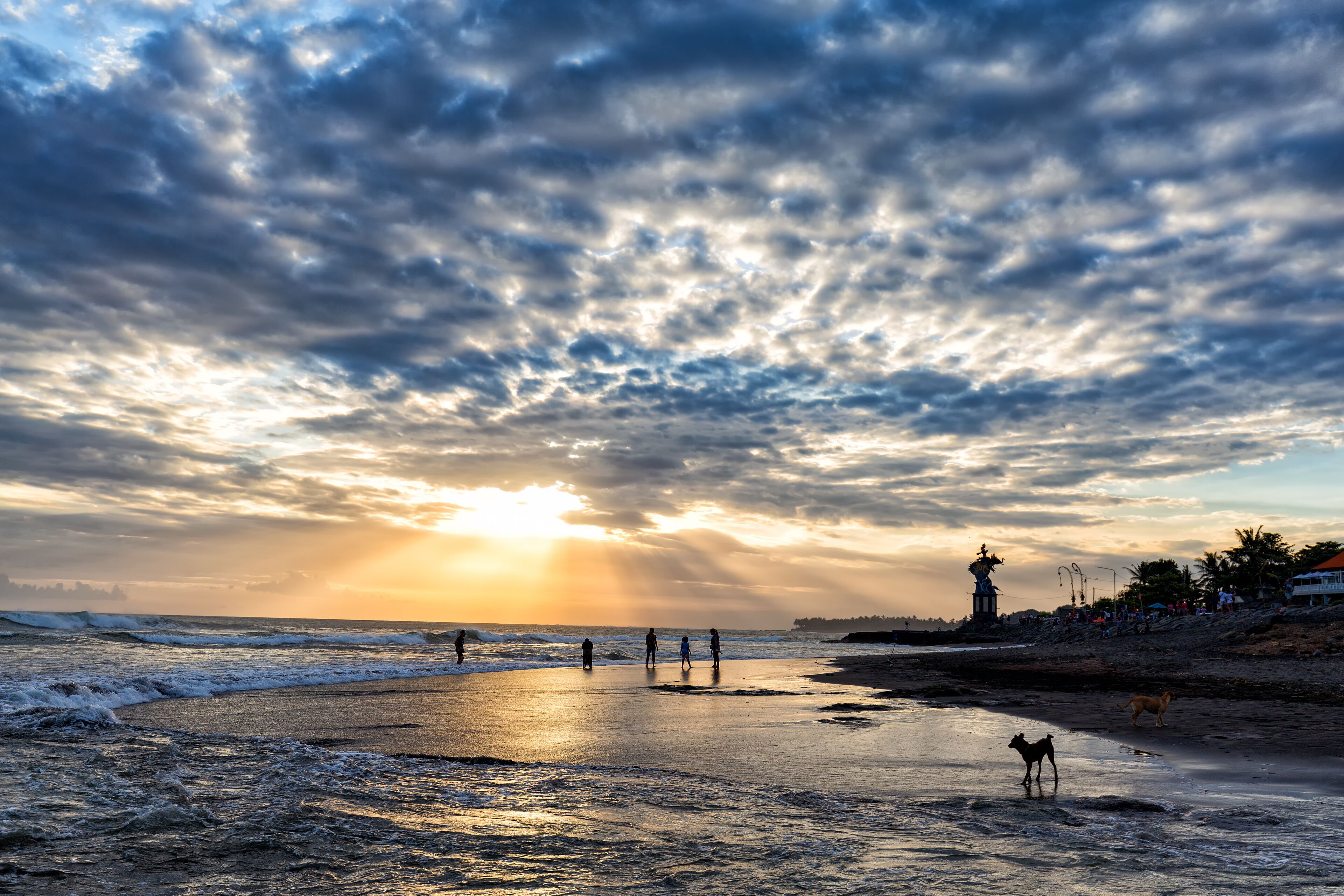 Sun sets on Pererenan beach in Canggu, Bali in Indonesia.