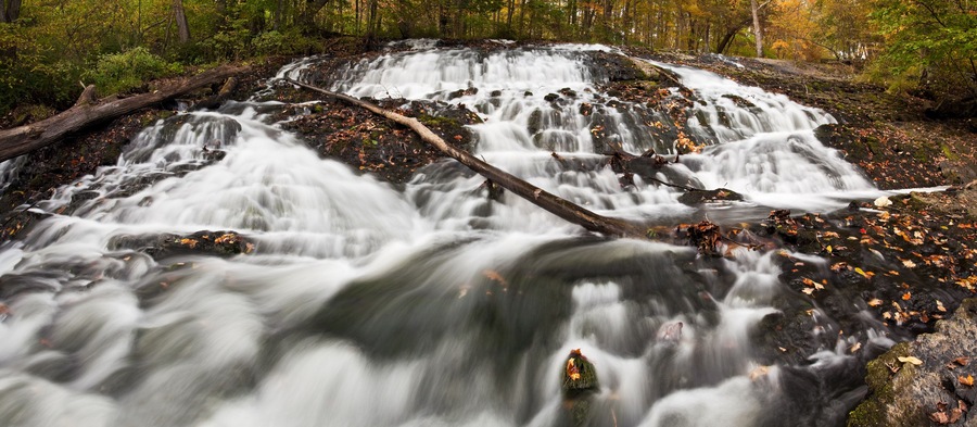 Buttermilk Falls in autumn, covered in fallen leaves