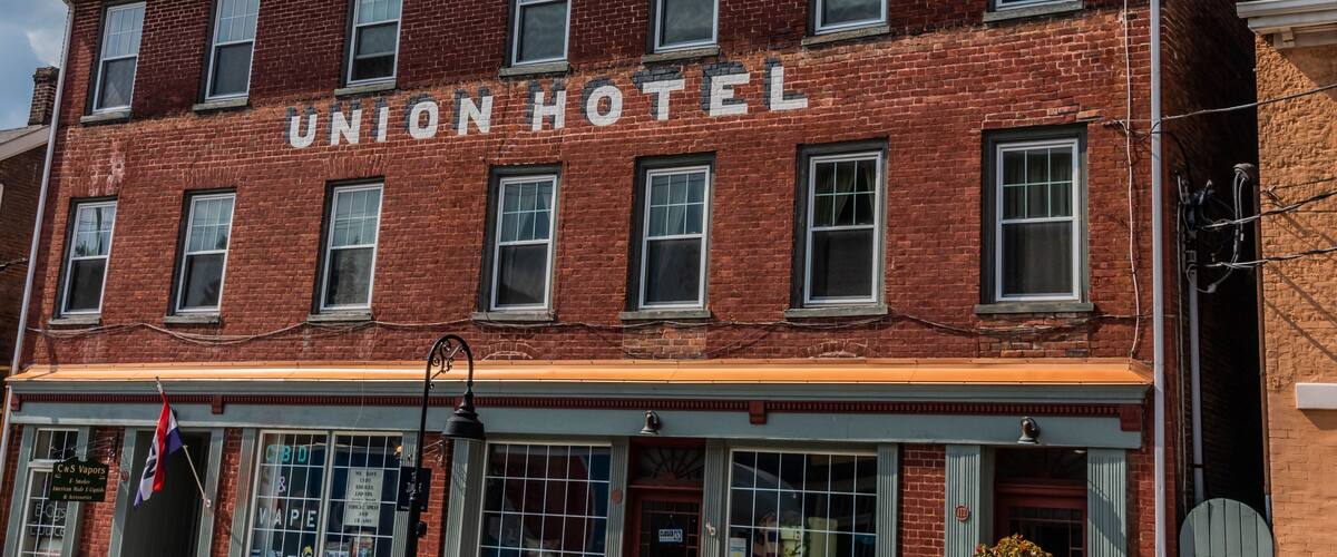 A red brick building with the sign "Union Hotel" on the front.