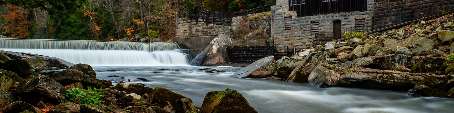 Rustic Mill Adjacent to Rushing Stream in Peak Autumn / Fall Season - McConnells Mill State Park - Pennsylvania