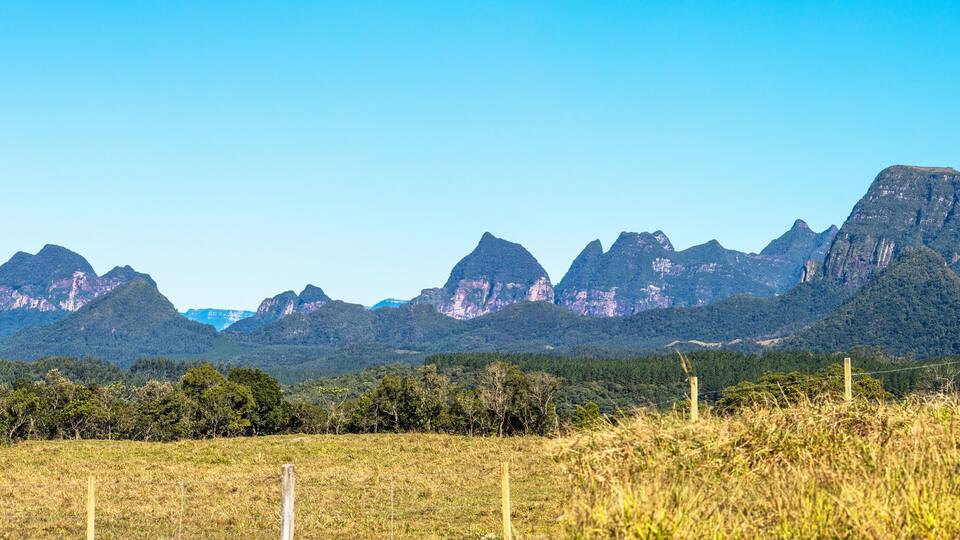 A mountainous landscape with a clear sky.