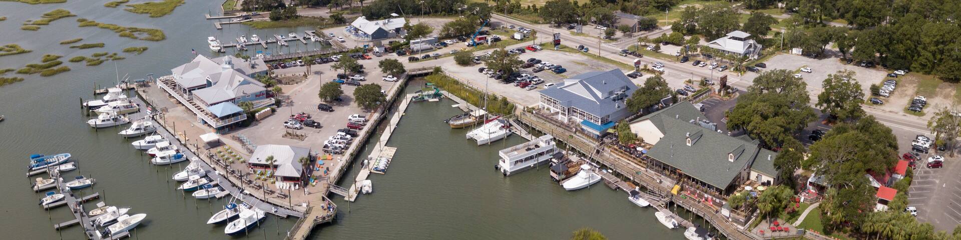 Aerial view of the waterfront with restaurants and marina in Murrells Inlet, South Carolina.
