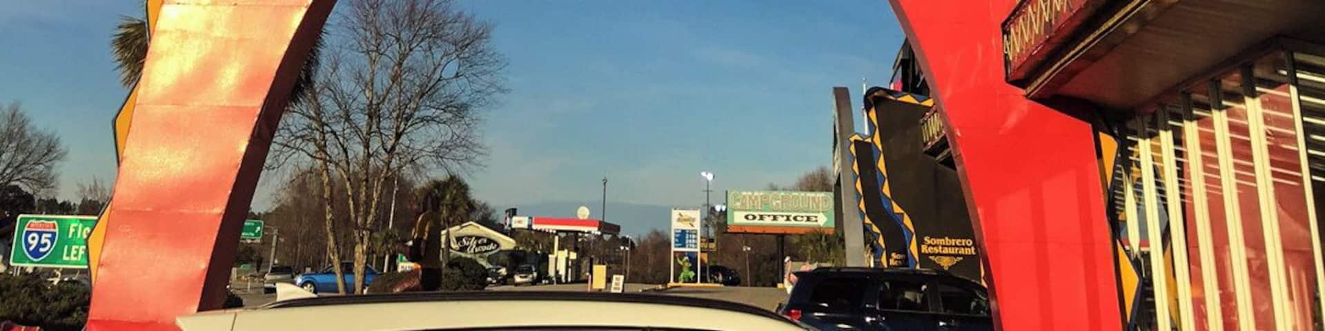South of the Border is a huge tourist trap south of the North Carolina and South Carolina state borders on Interstate 95-no place near Mexico, but this Mexican-style rest stop has been attracting people since the 1950's. Billboards advertising this famous truck/rest stop can be seen several states away, each sign with a catchy saying to make you smile and to count the miles till you can hang out with Pedro, the mascot of South of the Border.
There are several restaurants, gas stations and plenty of shopping for knick-knacks and fireworks. There is a hotel/motel and a campground-all have use of the huge indoor pool, as well as an outdoor pool. And if that wasn't enough to do, there is also mini-golf and a reptile exhibit. The building are sprawled over several blocks, each one painted bright colors and lit well by neon lights at night.