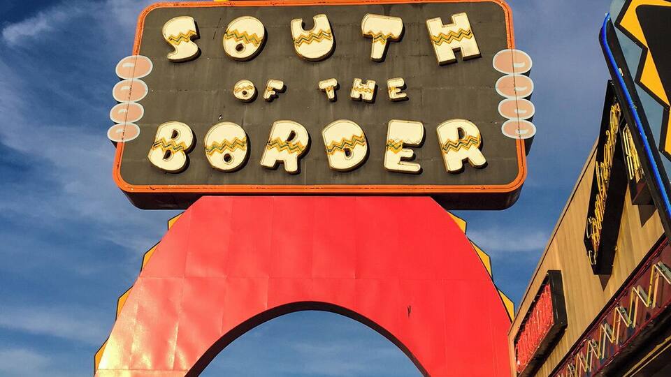 South of the Border is a huge tourist trap south of the North Carolina and South Carolina state borders on Interstate 95-no place near Mexico, but this Mexican-style rest stop has been attracting people since the 1950's. Billboards advertising this famous truck/rest stop can be seen several states away, each sign with a catchy saying to make you smile and to count the miles till you can hang out with Pedro, the mascot of South of the Border.
There are several restaurants, gas stations and plenty of shopping for knick-knacks and fireworks. There is a hotel/motel and a campground-all have use of the huge indoor pool, as well as an outdoor pool. And if that wasn't enough to do, there is also mini-golf and a reptile exhibit. The building are sprawled over several blocks, each one painted bright colors and lit well by neon lights at night.