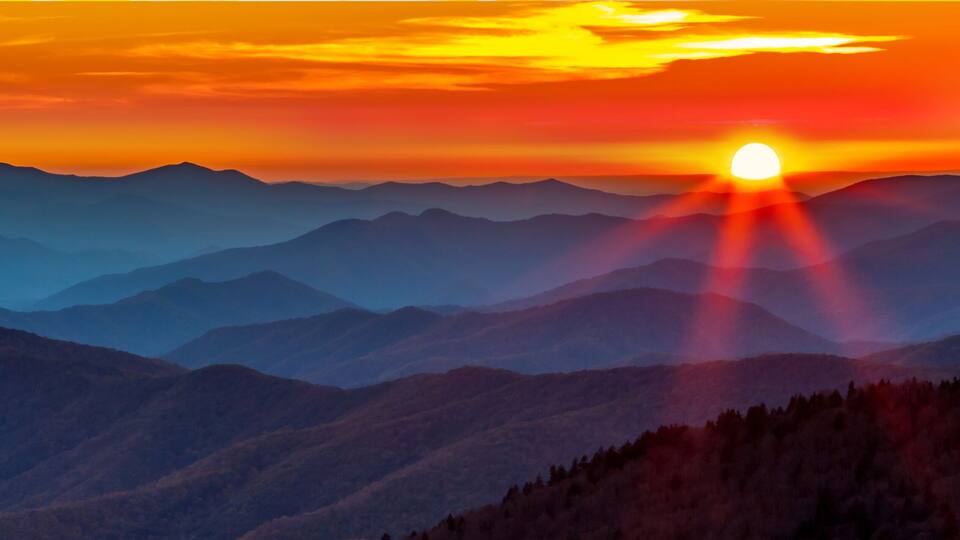 A mountain range with a sunset.