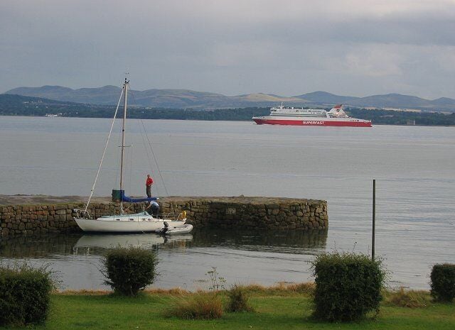 New Harbour, Dalgety Bay. Right on the edge of the square, an old harbour. Beyond the Pentlands, and the ferry sailing from Rosyth to Zeebrugge.