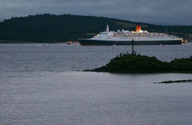 QE2 Firth of Forth Edinburgh The QE2 passing Downing Point and leaving Fife waters after her farewell visit to Scotland On the far side is Hound Point tanker terminal. Taken from the 'Secret Garden', Donibristle House, Dalgety Bay. Earlier: https://www.geograph.org.uk/photo/1002394