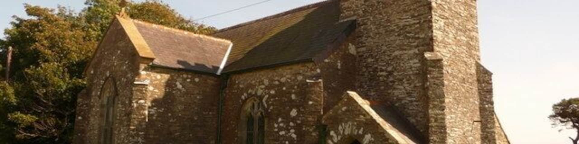 Buckland-tout-Saints: parish church of St. Peter Although the name of this parish would at first glance appear to be a French version of 'All Saints', it does not mean that as demonstrated by the fact that the church does not have this dedication. The name actually derives from 'Tout-Sain' meaning 'all whole' or 'all healed' this was the name of a family which was landowner in Saxon times.