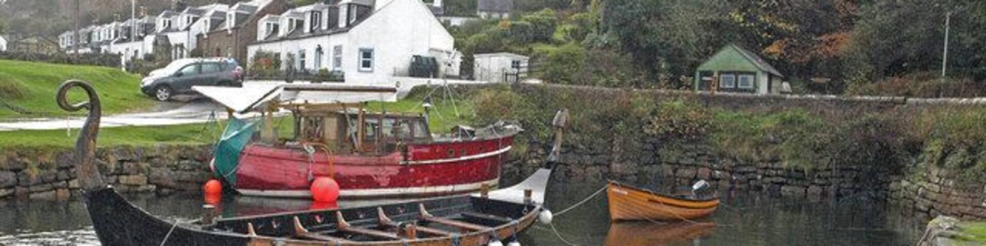 Corrie Harbour, Arran A Viking Longship in the harbour. Harking back to medieval times in Arran's history.