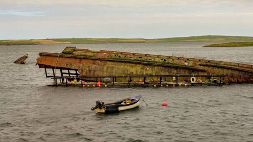 The remains of the German High Seas Fleet that was scuttled in Scapa Flow. View taken from X1 Stagecoach bus crossing the Churchill Barriers from Burray to Mainland (right hand side). #History