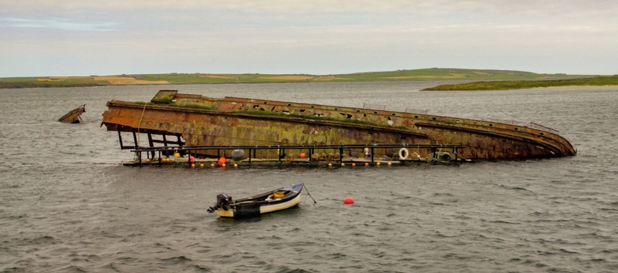The remains of the German High Seas Fleet that was scuttled in Scapa Flow. View taken from X1 Stagecoach bus crossing the Churchill Barriers from Burray to Mainland (right hand side). #History