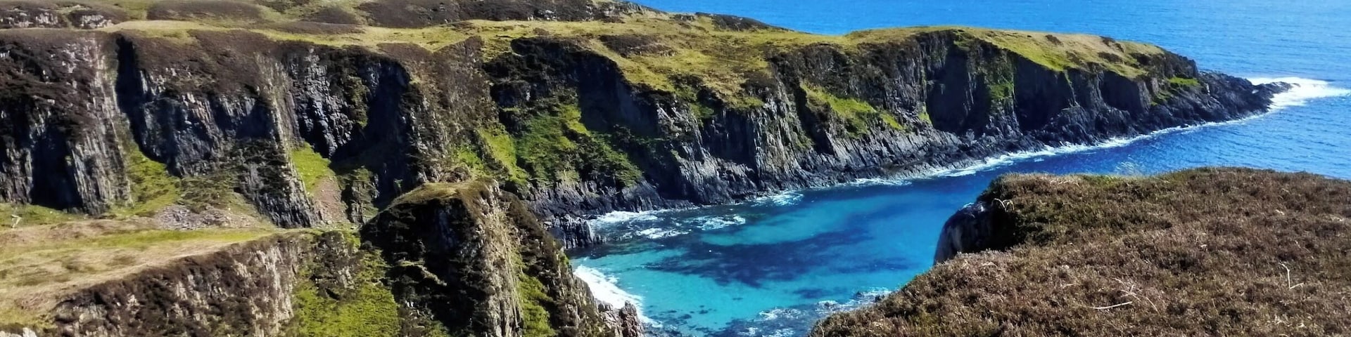 Isolated sandy beaches, spot eagles hovering above the cliffs.
