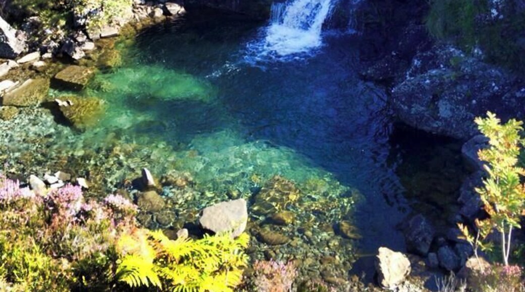 Glenbrittle Fairy Pools on the Isle of Skye. Stunning off the road tourist attraction. The water is so clear you can drink it! If you have the time, take some food and do a small hike to the base of the mountain range looming in the backgroud.