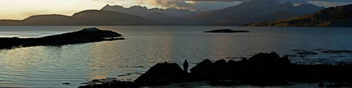 Ord/ An t-Òrd : near to sunset The view from Ord beach across Loch Eishort towards the Strathaird peninsula and to the Cuillin Hills in the far distance