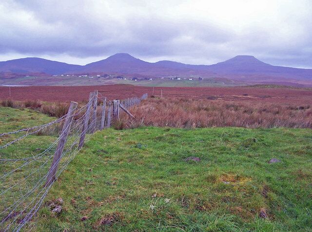 Moorland above Vatten Black cattle have been grazing this land all summer, but they had wandered to another part of the moor today. The distant strung-out township is Roag, and the hills are Healabhal Bheag (left of centre) and Healabhal Mhor (on the right) - more often referred to as MacLeod's Tables.