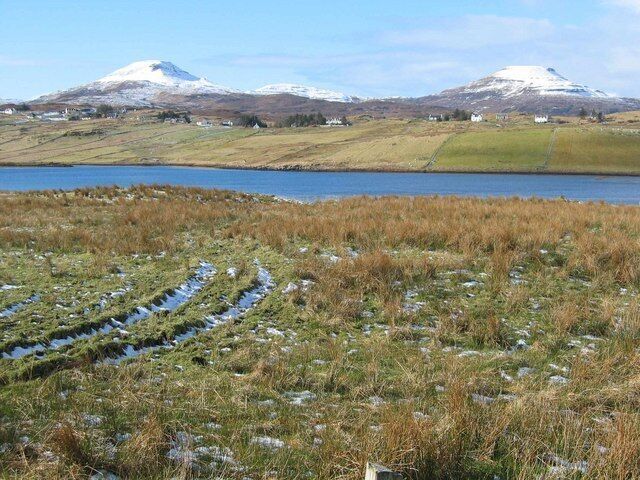 Uncultivated Croft Land at Vatten. These fields above Pool Roag appear to have been unused for years. Both MacLeod's Tables can be seen on the horizon.