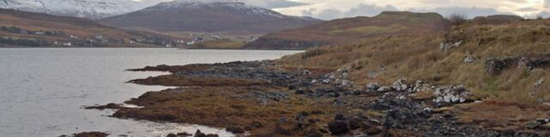East side of Aird Point Looking from east of the point at Aird, Bernisdale, towards Loch Eyre, with Kensaleyre in the distance.