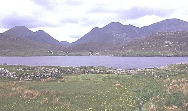 Loch Bun Abhainn Eadara. Looking north across the loch, the hills of North Harris form a distant backdrop. The name means "Loch at the bottom of the in-between river"!