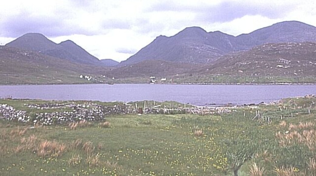 Loch Bun Abhainn Eadara. Looking north across the loch, the hills of North Harris form a distant backdrop. The name means "Loch at the bottom of the in-between river"!
