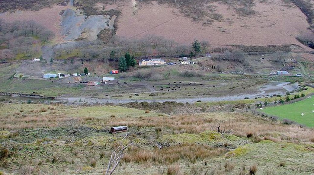 A view across the River Wye The building in the centre of the view is beside the A44 road. Looming above it is Pant Mawr (496 metres).