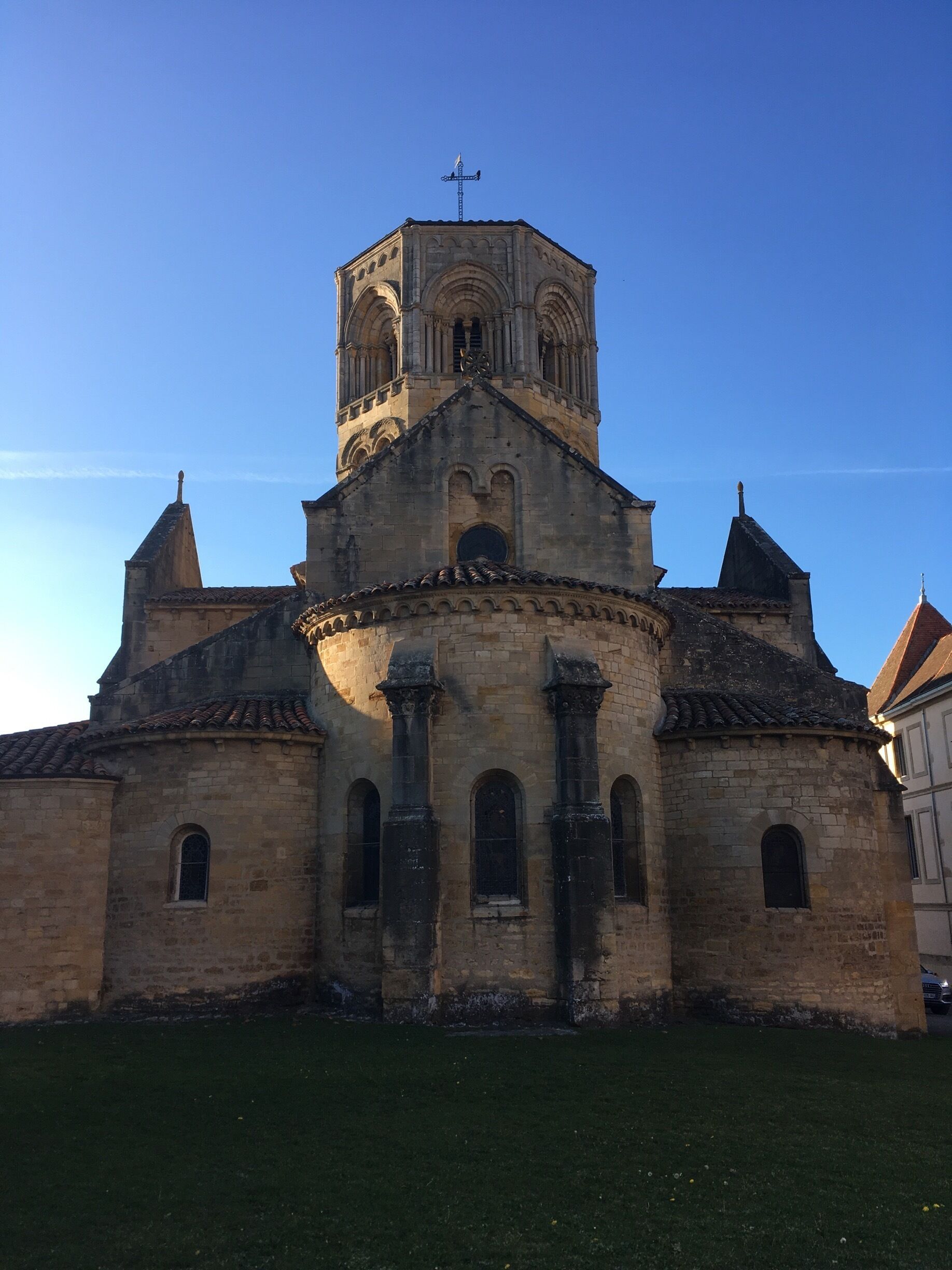 A historic church with a bell tower and arched windows.