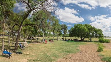 Panoramic white sandy shore and fresh water impoundment in Joe Pool, Lynn Creek Park outside Dallas, Texas