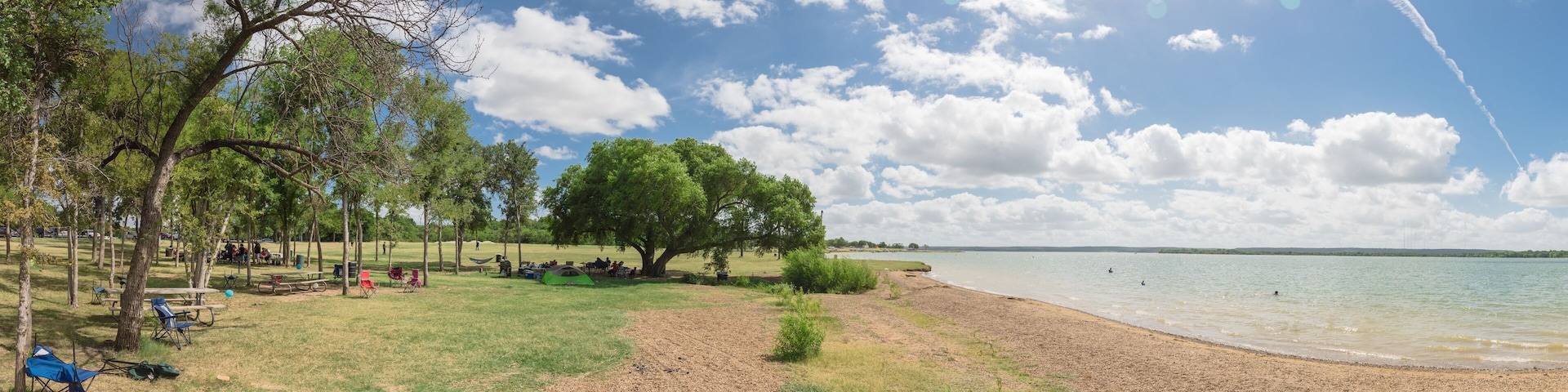 Panoramic white sandy shore and fresh water impoundment in Joe Pool, Lynn Creek Park outside Dallas, Texas