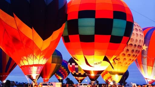 The Celina Balloon Festival The Old Celina Park at Celina , Texas from September 12-14'th 2014. Vibrantly patterned balloons glow and undulate as propane burners pump them with hot air. This festival also has a live band, carnival rides, food, fun and frolic. Pristine cars and trucks made as early as the 1930's shine at the classic car show. Entrance fee is $5 per person for a one day entry pass. Not to be missed!!!