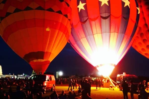 The Celina Balloon Festival The Old Celina Park at Celina , Texas from September 12-14'th 2014. Vibrantly patterned balloons glow and undulate as propane burners pump them with hot air. This festival also has a live band, carnival rides, food, fun and frolic. Pristine cars and trucks made as early as the 1930's shine at the classic car show. Entrance fee is $5 per person for a one day entry pass. Not to be missed!!!
#colorful