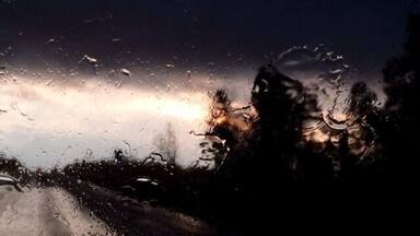 Sun rises behind the rain clouds!!