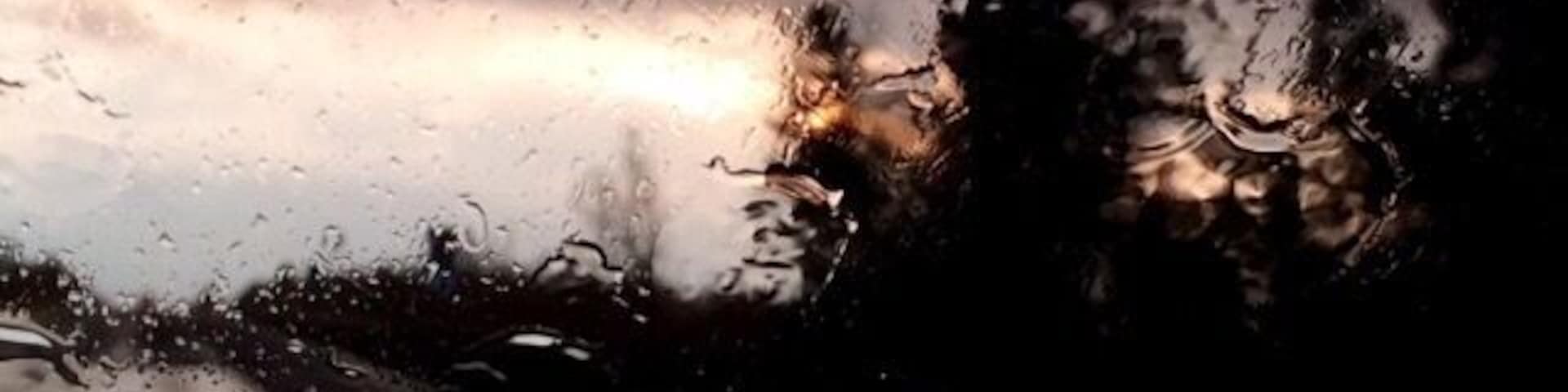 Sun rises behind the rain clouds!!