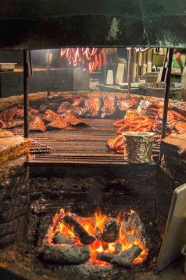 The iconic open fire pit is the first thing you see upon arrival to Salt Lick BBQ in Texas. To say that it's jaw-dropping is to say nothing. 
I spent half an hour jumping around with my camera, and you will too! Then, enjoy the brisket, sausage and ribs at the outside patio. #FoodieFinds