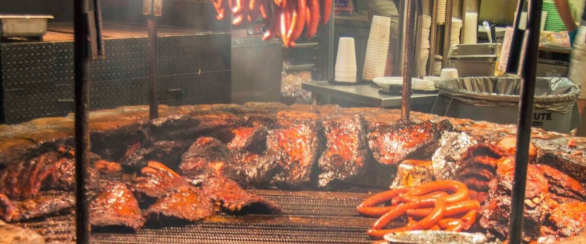 The iconic open fire pit is the first thing you see upon arrival to Salt Lick BBQ in Texas. To say that it's jaw-dropping is to say nothing.
I spent half an hour jumping around with my camera, and you will too! Then, enjoy the brisket, sausage and ribs at the outside patio. #FoodieFinds