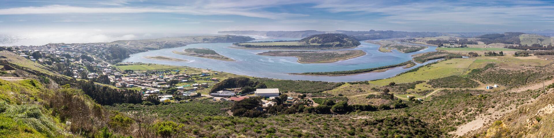 Meanders at the delta river Rapel in the town of La Boca. An amazing view of the bends of the river looking for an exit to the Pacific Ocean in between the valleys, hills and forests an awe landscape