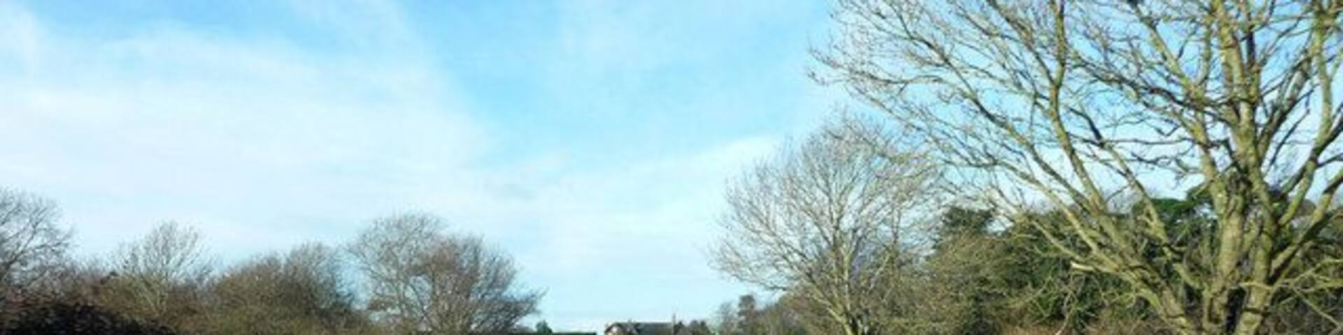 View west from Broadwash Bridge towards Aldsworth Manor