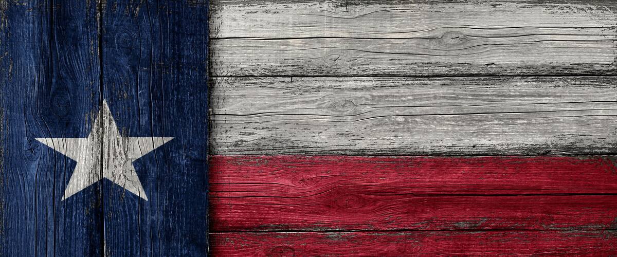 A wooden surface with a star and stripes pattern.