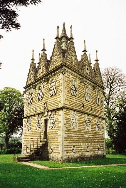 Rushton Triangular Lodge, Northamptonshire, England. Everything here has to do with the number 3. The building is 3-sided, each with 3 windows and 3 gables (triangular of course), and an inscription of 33 letters measuring 33 feet in length. It is a 3-storey building and is topped by a 3-sided chimney. It was built by a man with a name suggesting the number 3 – Sir Thomas Tresham – between 28 July 1594 and 29 September 1597 and it symbolises the Holy Trinity. Tresham's coat of arms consists of three trefoils.