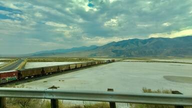 Salt flats are dried-up desert lakes. They form in closed hollows where rainfall can't drain away. In a wet climate, a lake would form but, in a desert, the water is heated and evaporates into vapour faster than it is replenished by rain. The salt and minerals dissolved in the water are left behind as a solid layer.