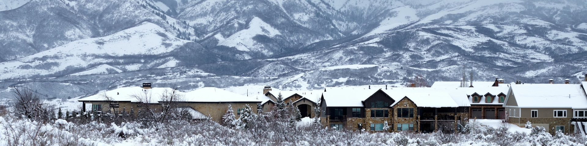 Recently built houses in Mountain Green, Morgan County, Utah, with mountains of the Wasatch Range in the background.