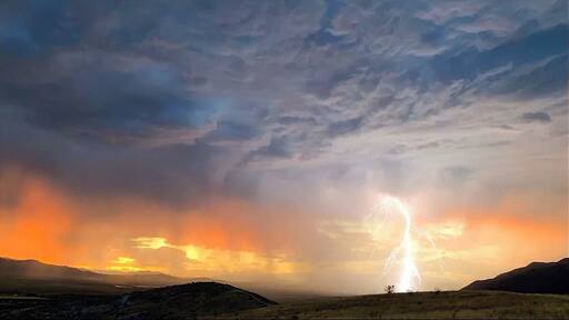 I caught this photo in the hills around Santaquin, Utah. I was just recording a video of the sunset when out of nowhere lightning started striking! #adventure