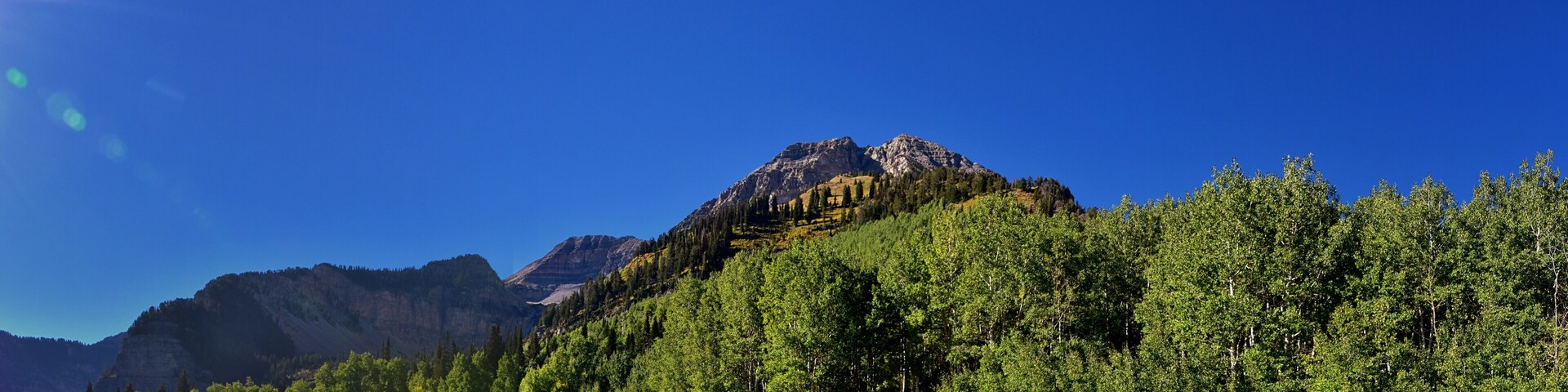 Timpanogos Peak back views hiking Bear Canyon Trail Wasatch Range, Utah. United States.