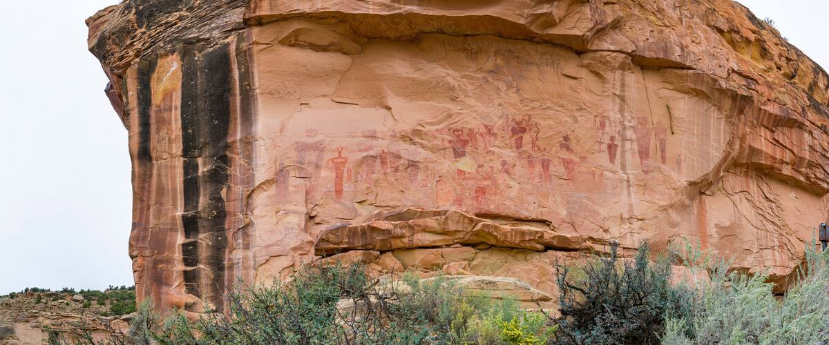 A large rock formation with ancient petroglyphs.