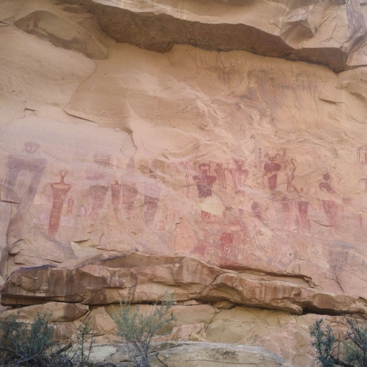A rock face with ancient petroglyphs.