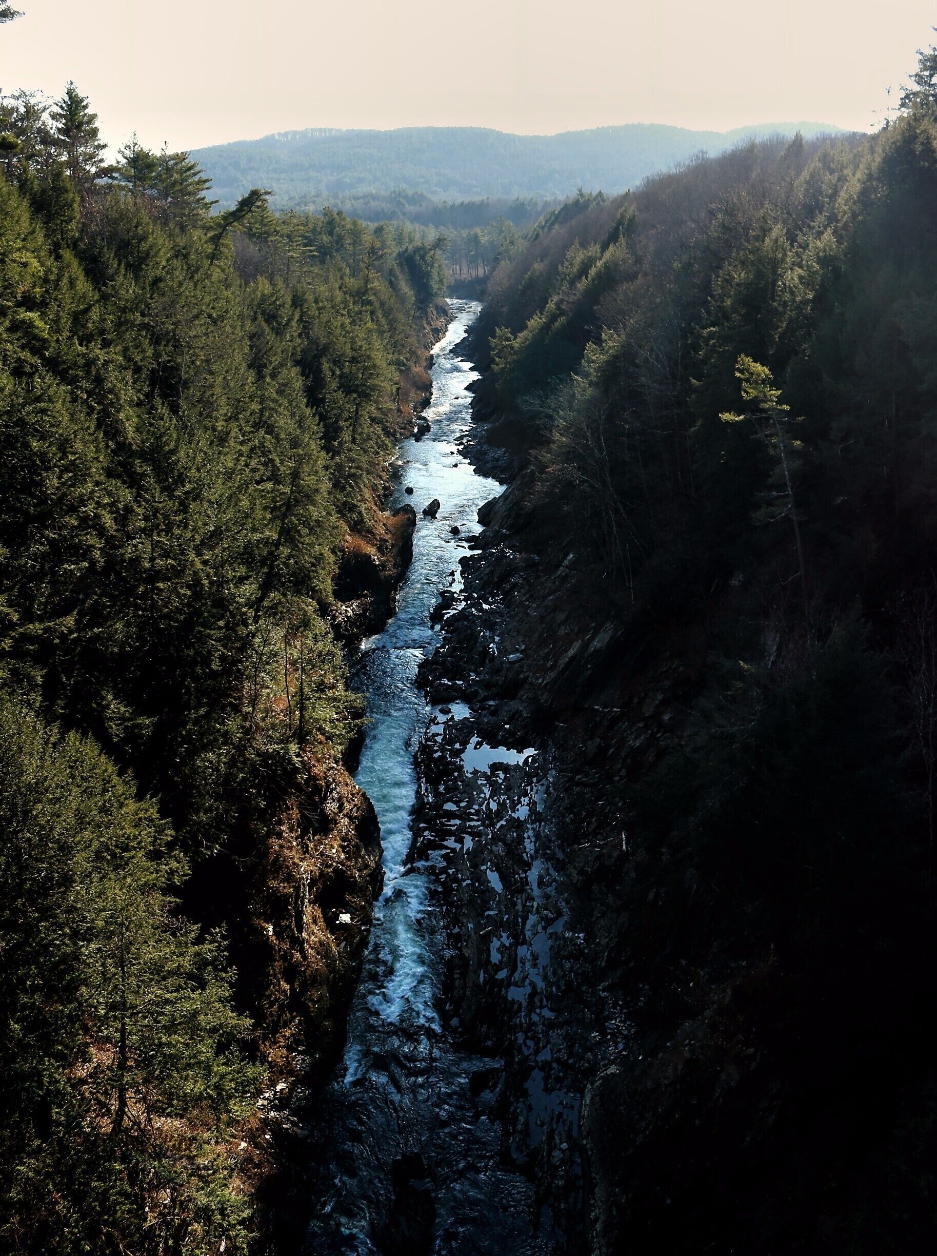 Looking down into the 41.4-mile-long Ottauquechee river in Vermont.!! The gorge is 165 feet deep and is the deepest gorge in Vermont.