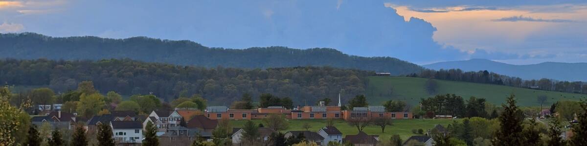 Mountain sunset with storm brewing