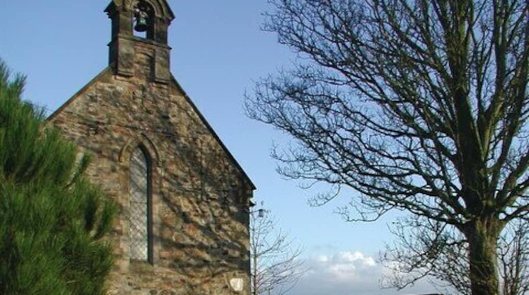 West front of St Edmund's chapel, Fraisthorpe, East Riding of Yorkshire, England, seen from the northwest. The chapelry of Fraisthorpe was united with Barmston rectory in 1929. Before that it had been combined with the benefice of Carnaby. The ecclesiastical parishes remained separate until 1979 when the new parish of Barmston with Fraisthorpe was created and united with that of Skipsea with Ulrome. The civil parish of Fraisthorpe with Auburn was made part of the new Barmston civil parish in 1935.