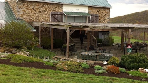 Up on a hill you will find this restored barn and tasting room. Outside enjoy a glass of wine and the wonderful views. I suggest the Chardonnay.
