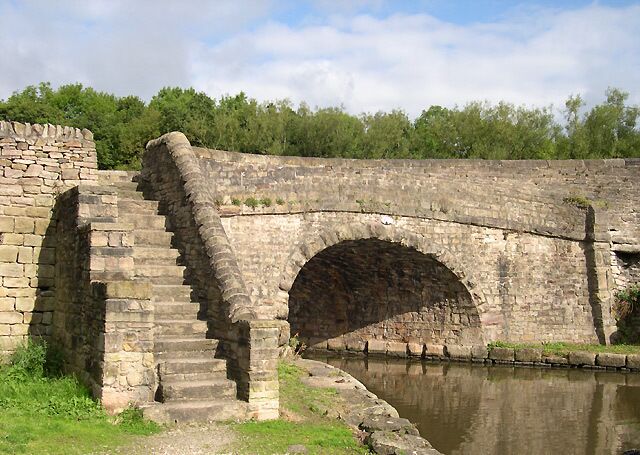 A Sunny Day at Bridge 61, Bugsworth Basin, Derbyshire. The whole grim and grey appearance which showed in yesterday's dull weather (571195)has been transformed in the bright sunlight today.