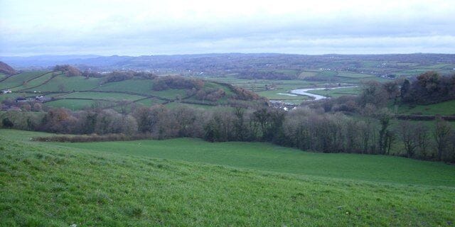 The Tywi (Towy) valley A view of the river Tywi with White Mill just visible on the near side of the river.