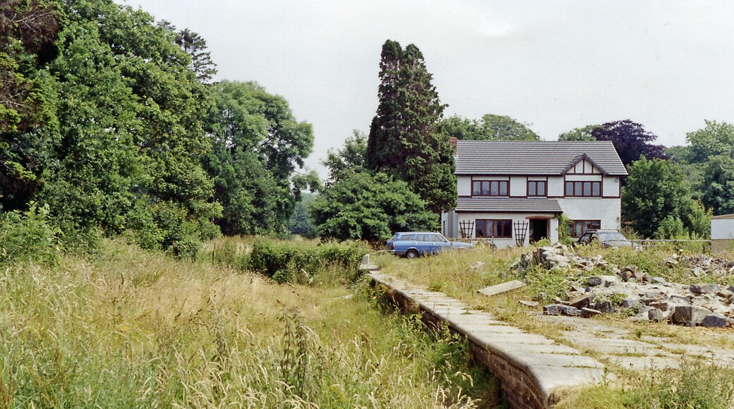 Abergwili station (remains). View eastward, towards Llandilo: ex-LNWR Llandilo - Carmarthen branch, all closed 9/9/63. The house appears to be newer.